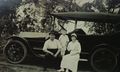 1915-Edward, Roland, Lydia Scheele Sitting on Car.JPG