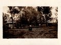 1917- Roland Scheele sitting in front of original Jaus Farm house.jpg