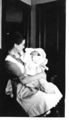 1922 - Clara Hinderer Baur holding son Ralph.jpg