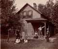 1899 - Original Jaus Log cabin 1883-1905 Martin and Louise Jaus with Lydia-Anna-Otto-Martin-Herbert .jpg