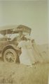 1918 - Henry Gruenhagen in car and women pushing.jpg